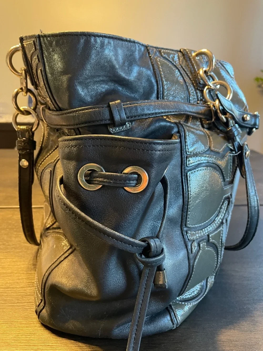 Coach Colette Black Leather Shoulder Bag with Signature Circle Appliqué